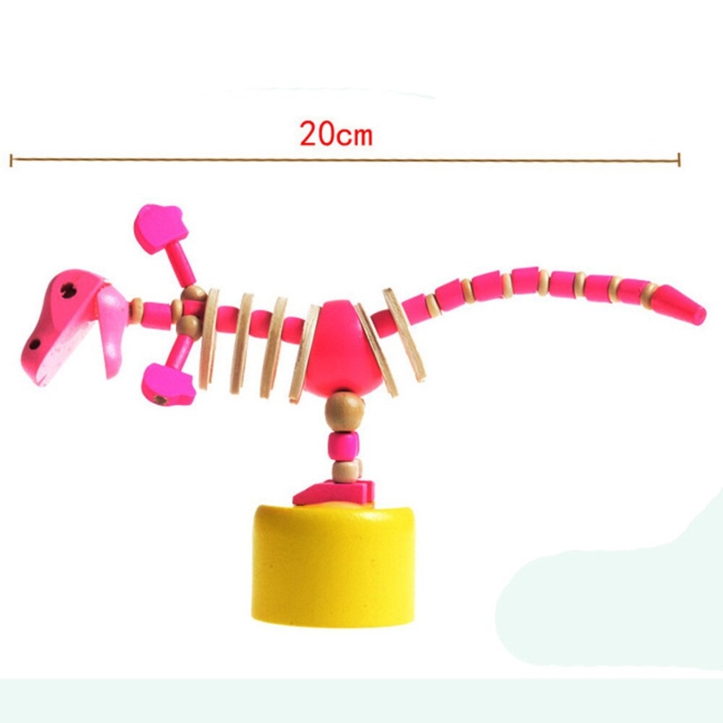 Drukpop Dino lengte 20 cm H 9,5 cm B 6 cm